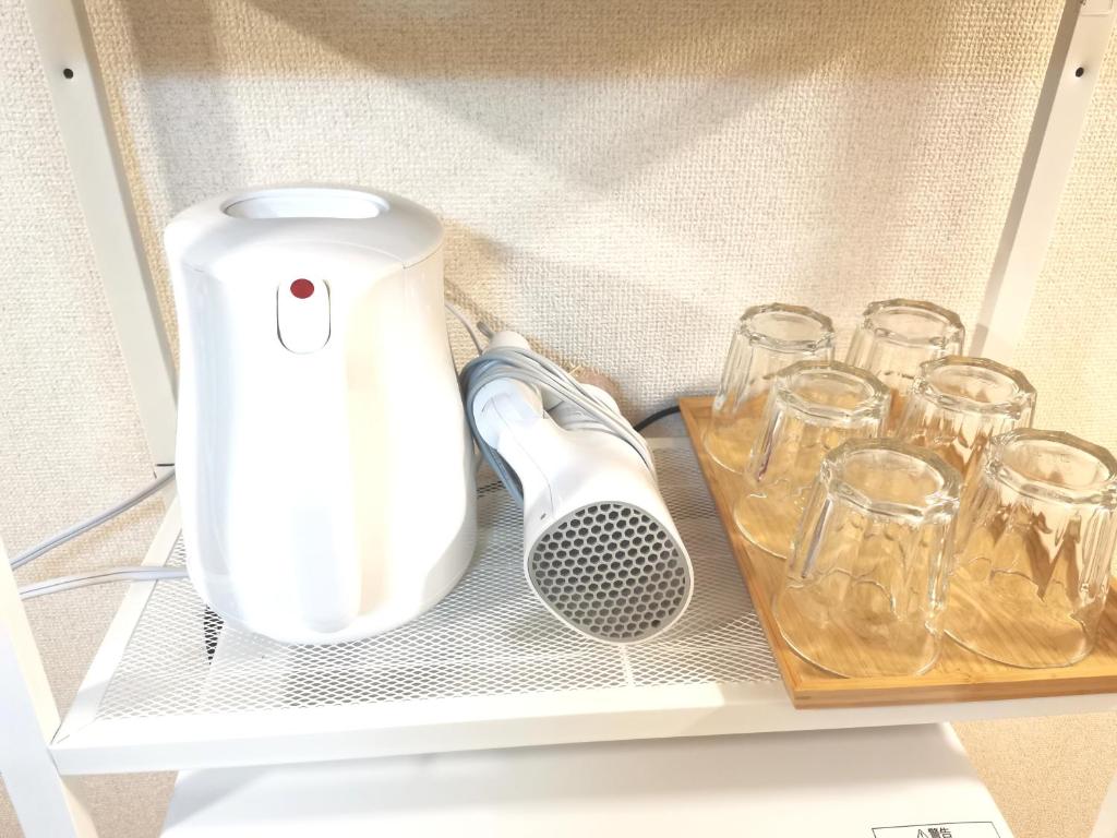 Fasilitas pembuat kopi dan teh di B Shinjuku Self Check in