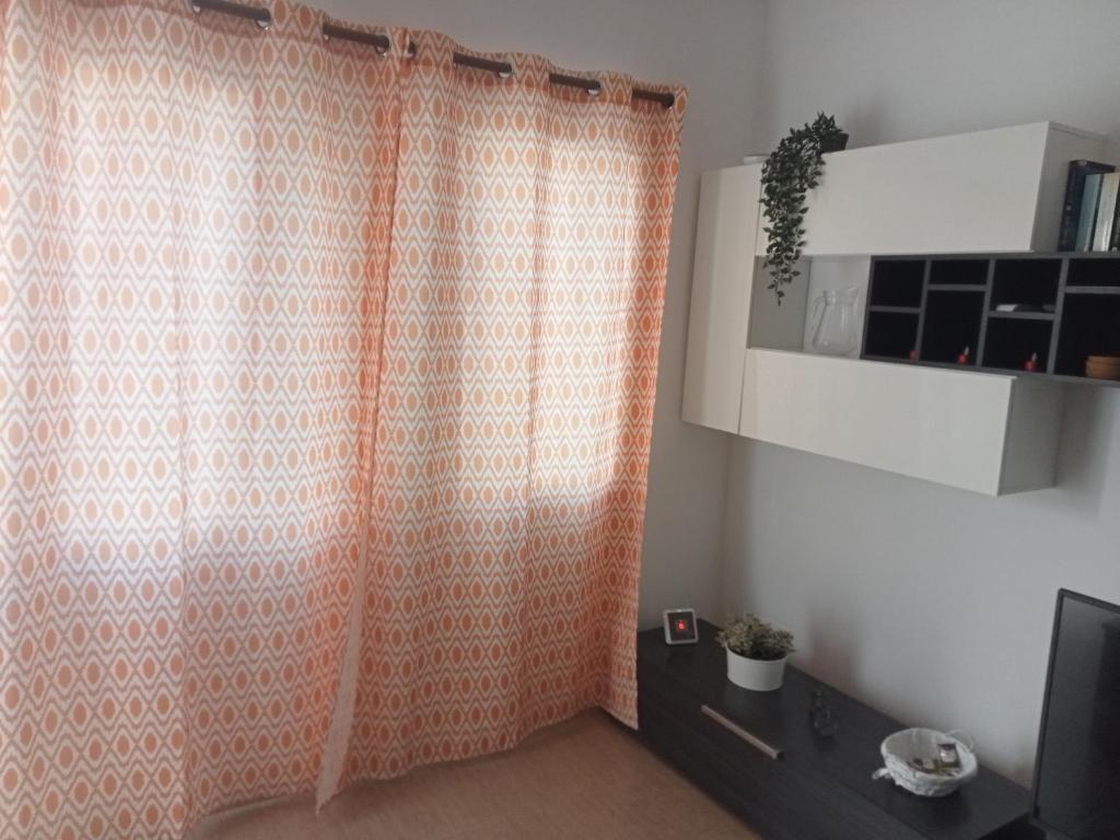 Televízia a/alebo spoločenská miestnosť v ubytovaní Casa Analiz