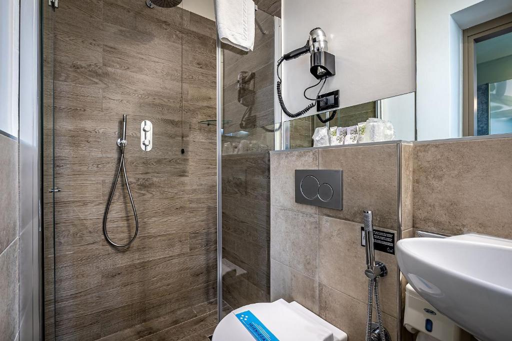 Koupelna v ubytování Hotel Duomo Firenze