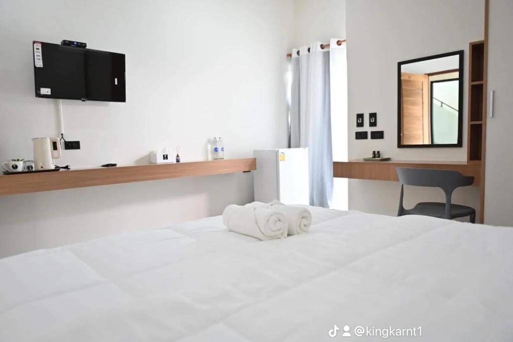 Postel nebo postele na pokoji v ubytování T-OneHome