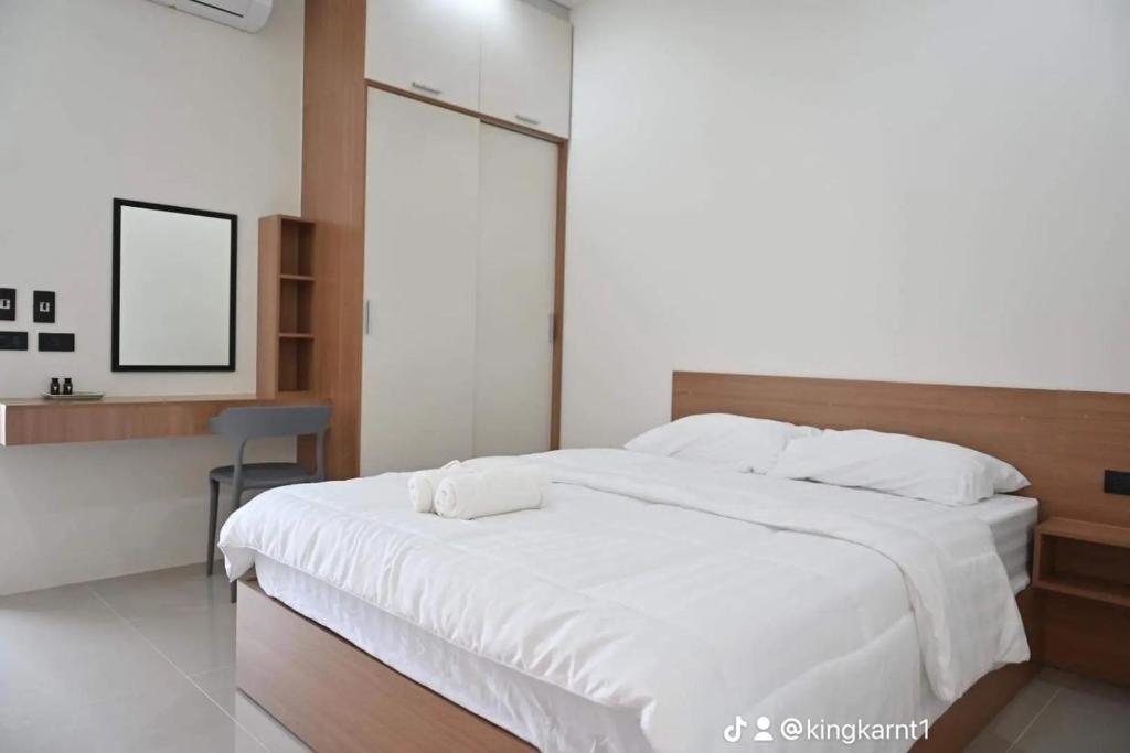Postel nebo postele na pokoji v ubytování T-OneHome