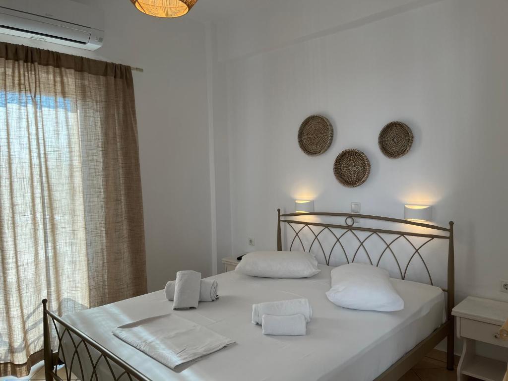 Postel nebo postele na pokoji v ubytování Hotel Chrisoula