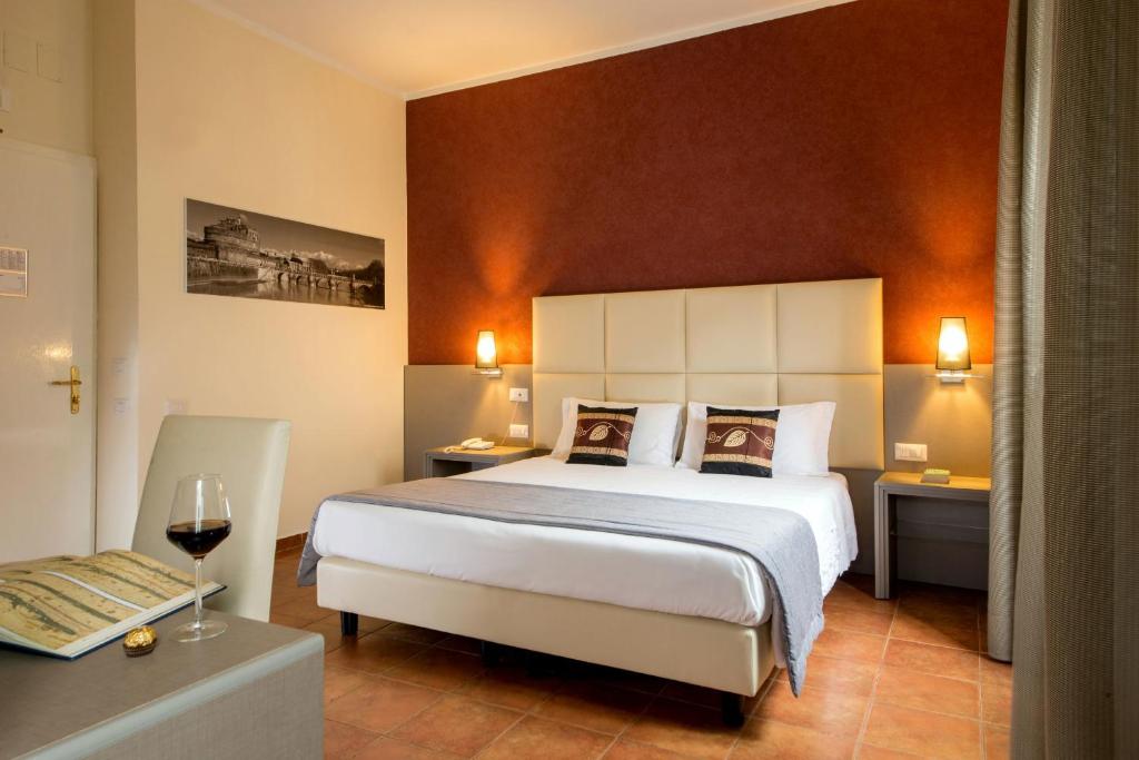Postel nebo postele na pokoji v ubytování Hearth Hotel