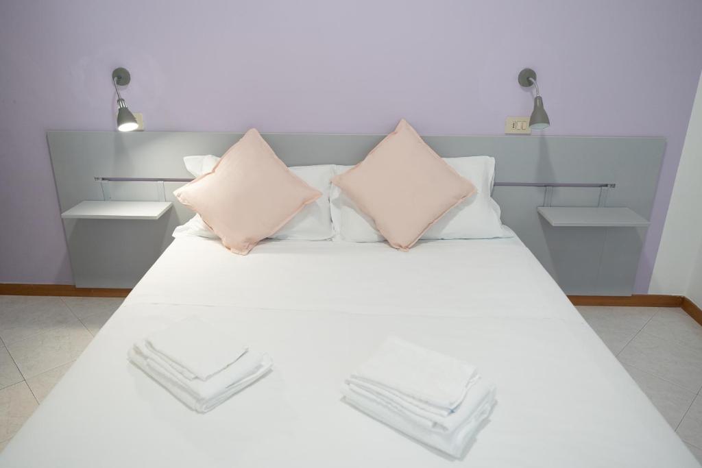Katil atau katil-katil dalam bilik di Hotel The Sea