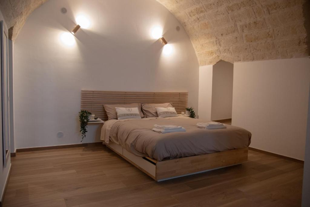 Ένα ή περισσότερα κρεβάτια σε δωμάτιο στο Loft Michelangelo