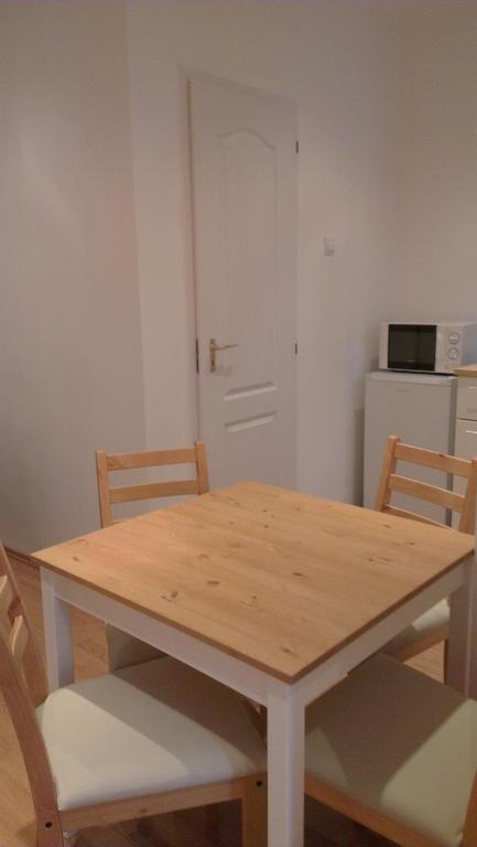 Televízia a/alebo spoločenská miestnosť v ubytovaní Apartman 4 You Westend