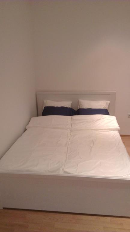 Posteľ alebo postele v izbe v ubytovaní Apartman 4 You Westend