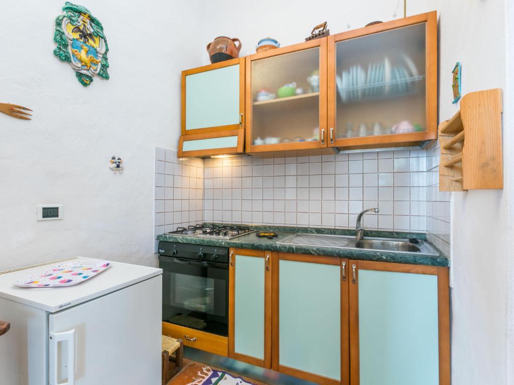 Kuchyň nebo kuchyňský kout v ubytování Holiday Home Podere Casina by Interhome