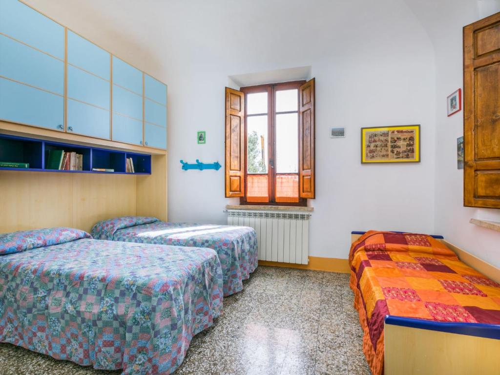 Postel nebo postele na pokoji v ubytování Holiday Home Podere Casina by Interhome