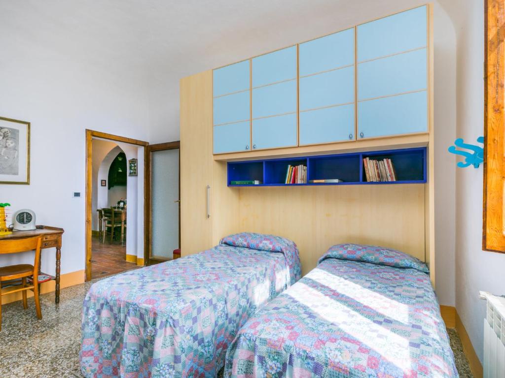 Postel nebo postele na pokoji v ubytování Holiday Home Podere Casina by Interhome