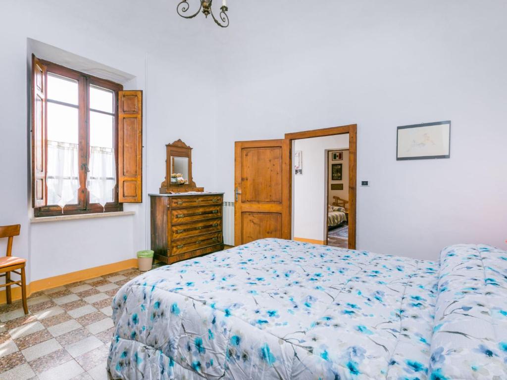 Postel nebo postele na pokoji v ubytování Holiday Home Podere Casina by Interhome