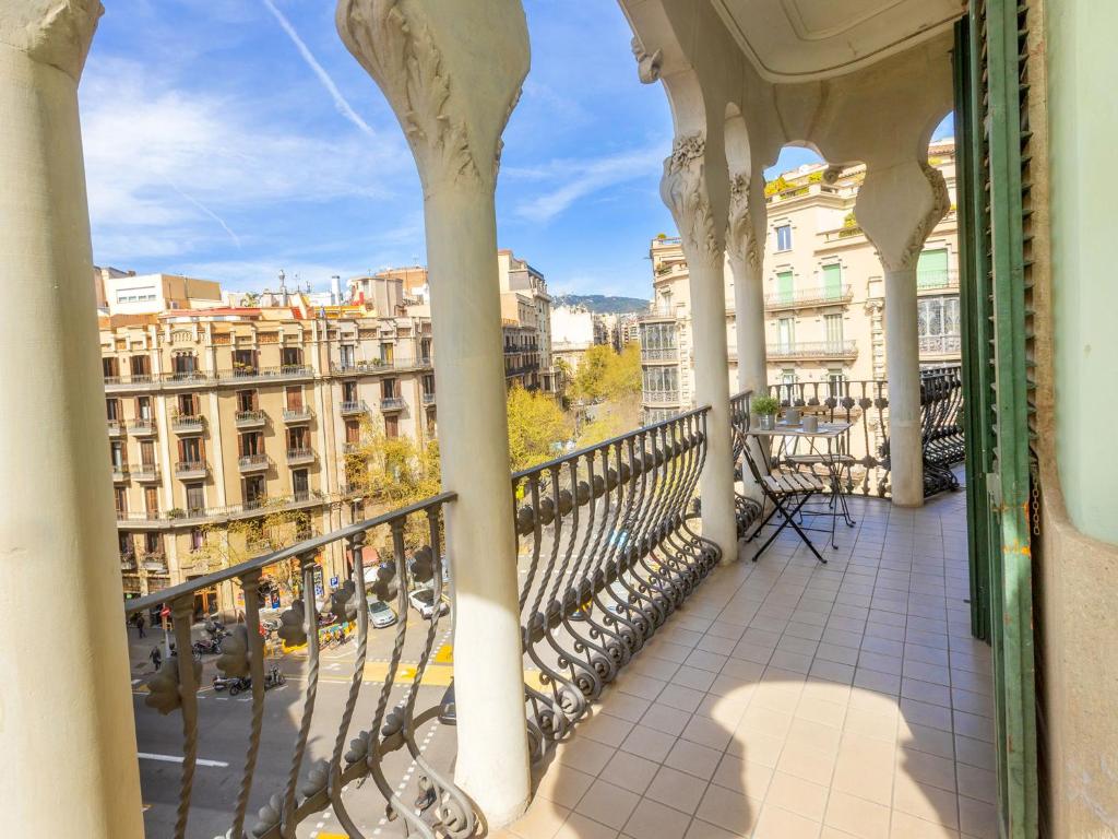 a balcony with a view of a city at Apartment Eix-Dret-Roger de LLuria-Valencia by Interhome in Barcelona