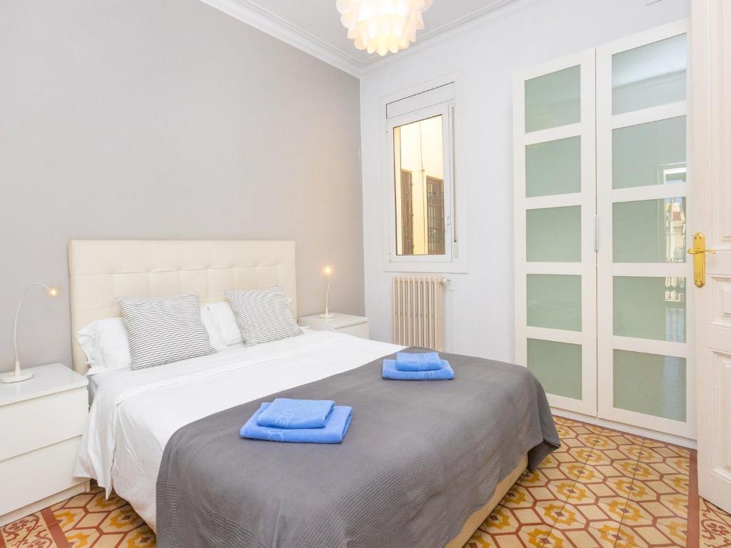 Postel nebo postele na pokoji v ubytování Apartment Eix-Dret-Roger de LLuria-Valencia by Interhome