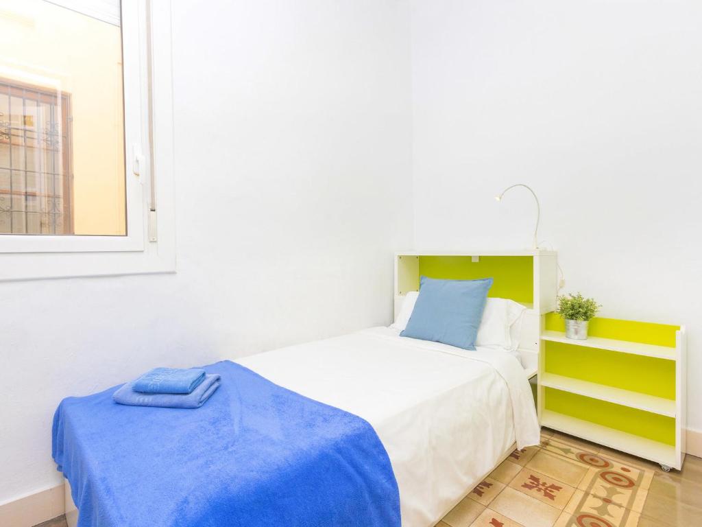 Postel nebo postele na pokoji v ubytování Apartment Eix-Dret-Roger de LLuria-Valencia by Interhome