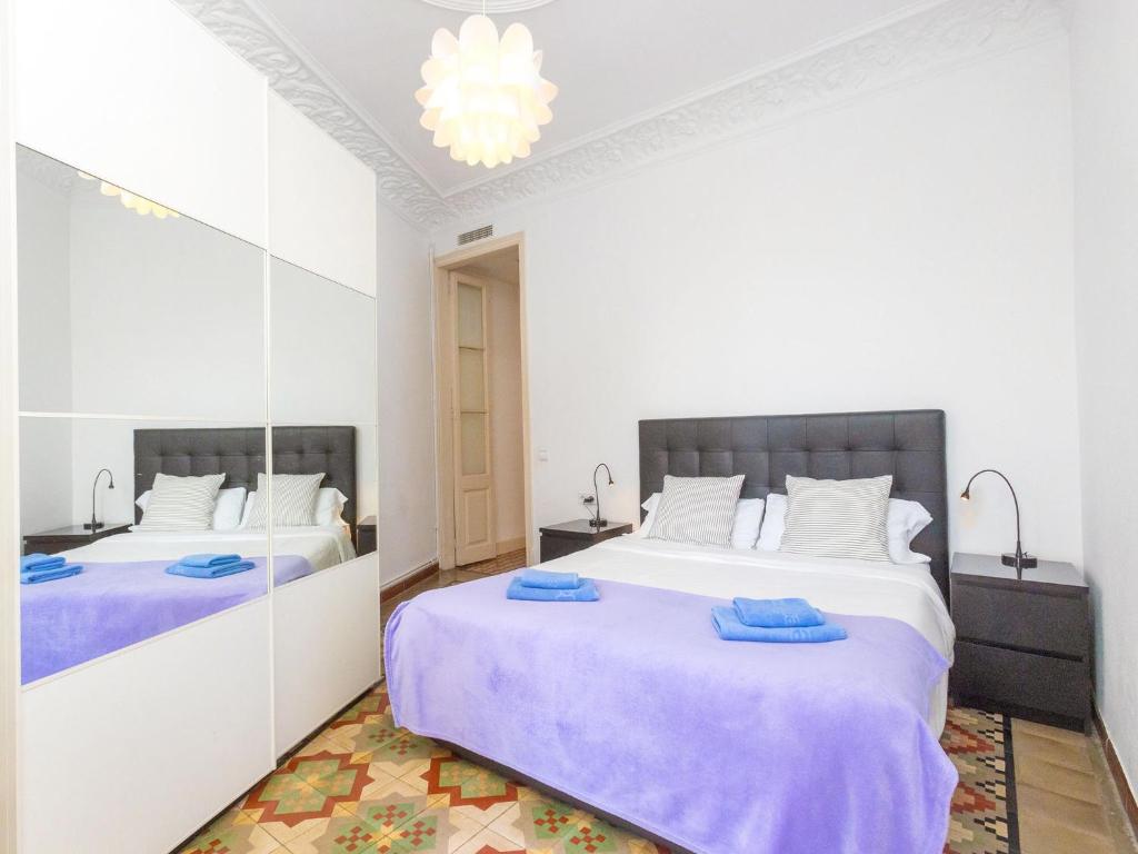Postel nebo postele na pokoji v ubytování Apartment Eix-Dret-Roger de LLuria-Valencia by Interhome