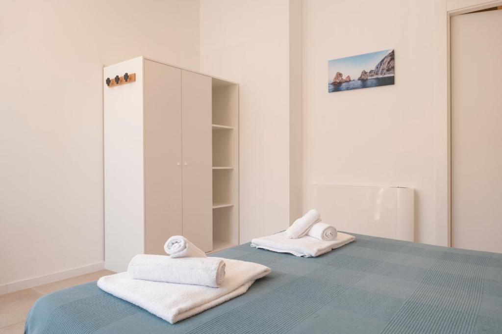 Postel nebo postele na pokoji v ubytování Onda del Conero