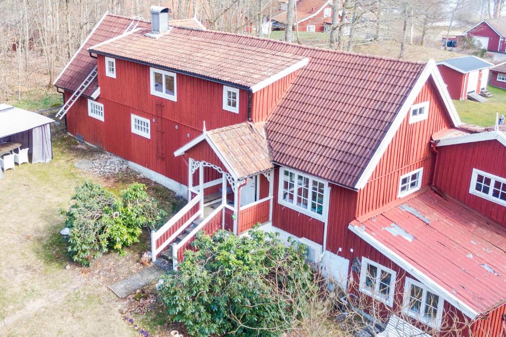 an aerial view of a red barn at Lyrkroken in Vittsjö