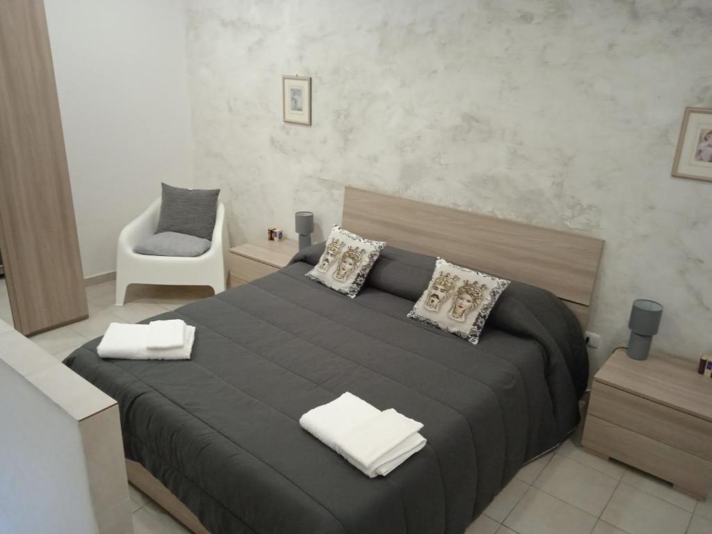 Posteľ alebo postele v izbe v ubytovaní Case Serena vacanze relax