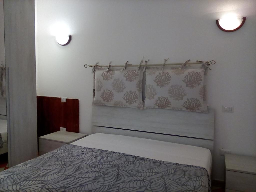Posteľ alebo postele v izbe v ubytovaní Casa di Agnese