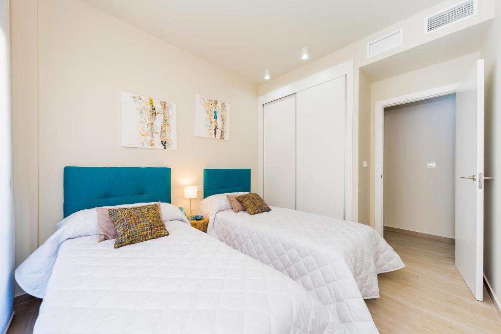 Posteľ alebo postele v izbe v ubytovaní Apartamento Alegria ID8
