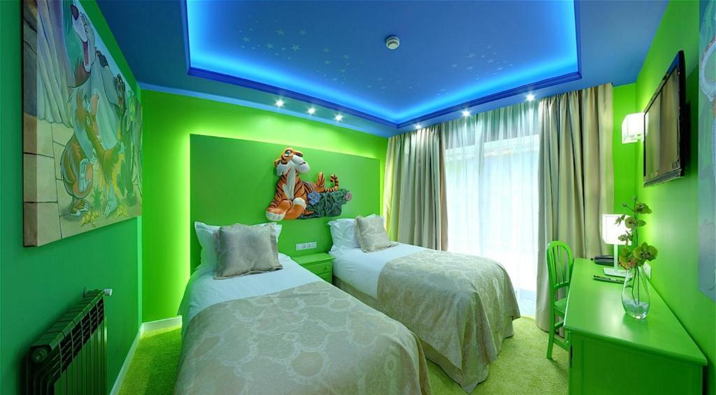 Postel nebo postele na pokoji v ubytování Hotel Princesa Parc Excellence