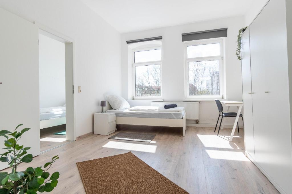 Posezení v ubytování Komfortable Monteursunterkunft: 4-Zimmer-Wohnung mit getrennten Betten