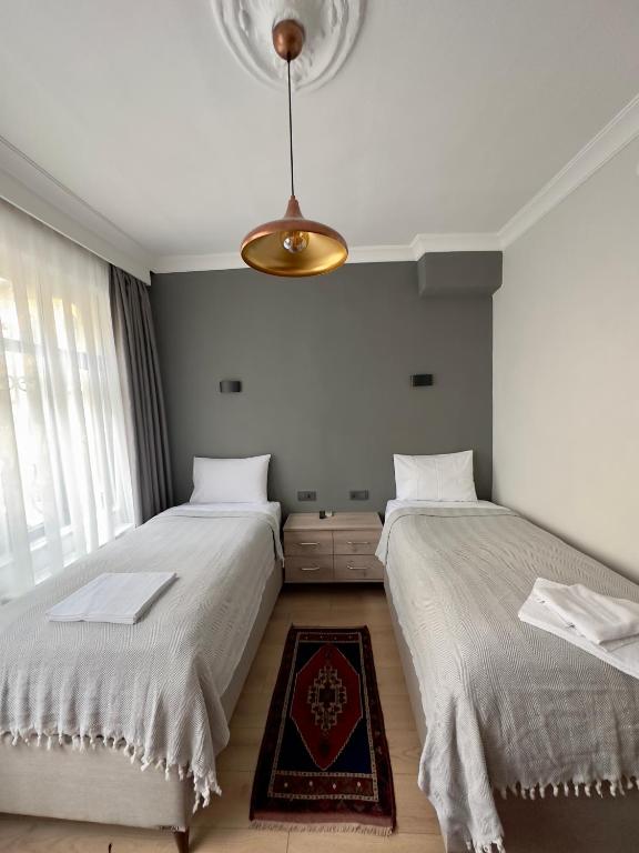 Postel nebo postele na pokoji v ubytování Terrace Guesthouse