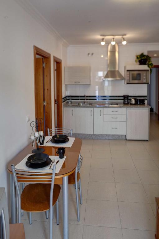 Kuchyň nebo kuchyňský kout v ubytování Apartment Ambrosia