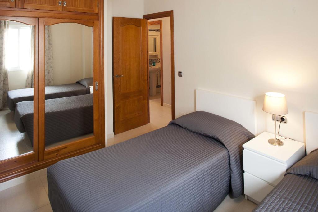 Postel nebo postele na pokoji v ubytování Apartment Ambrosia
