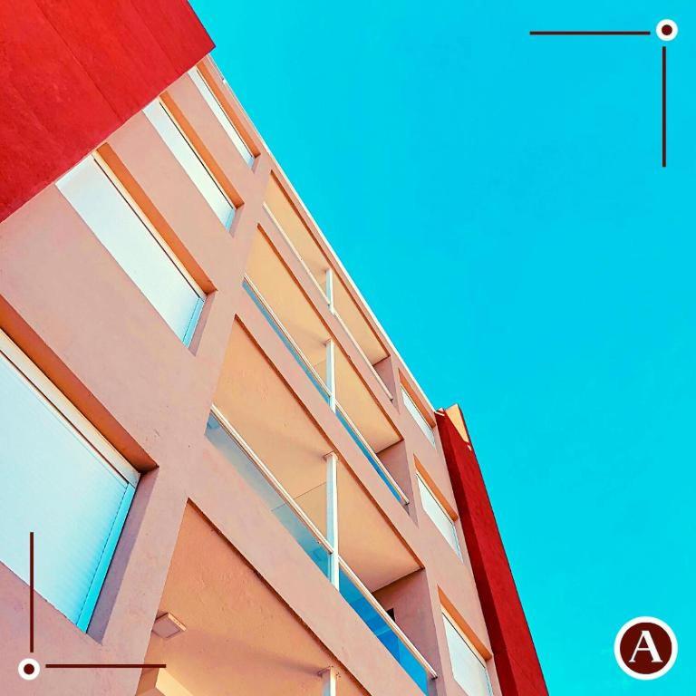 a building with a staircase on the side of it at AC Departamentos in Cordoba