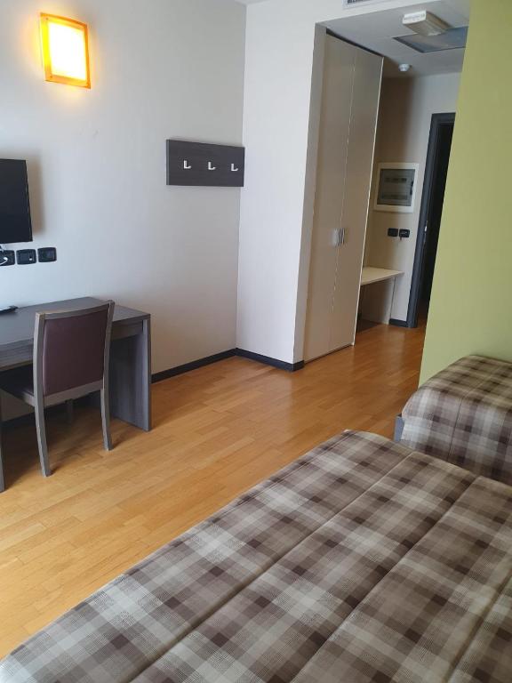Postel nebo postele na pokoji v ubytování eq hotel