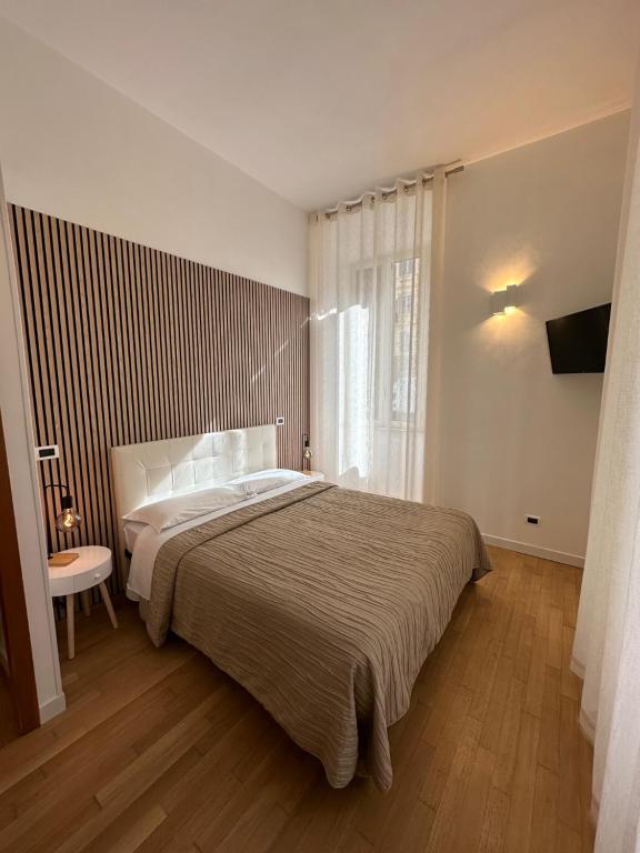 Postel nebo postele na pokoji v ubytování Green Hotel