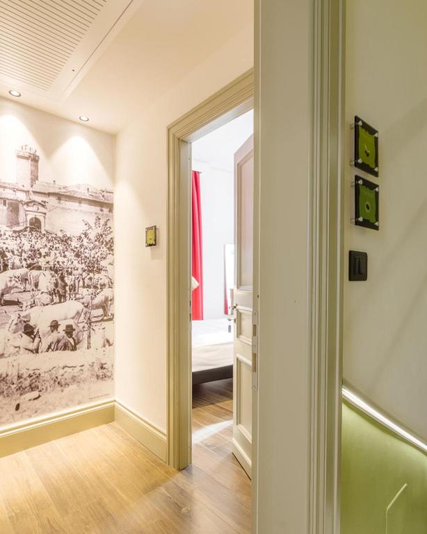 Postel nebo postele na pokoji v ubytování Palazzo Fontana