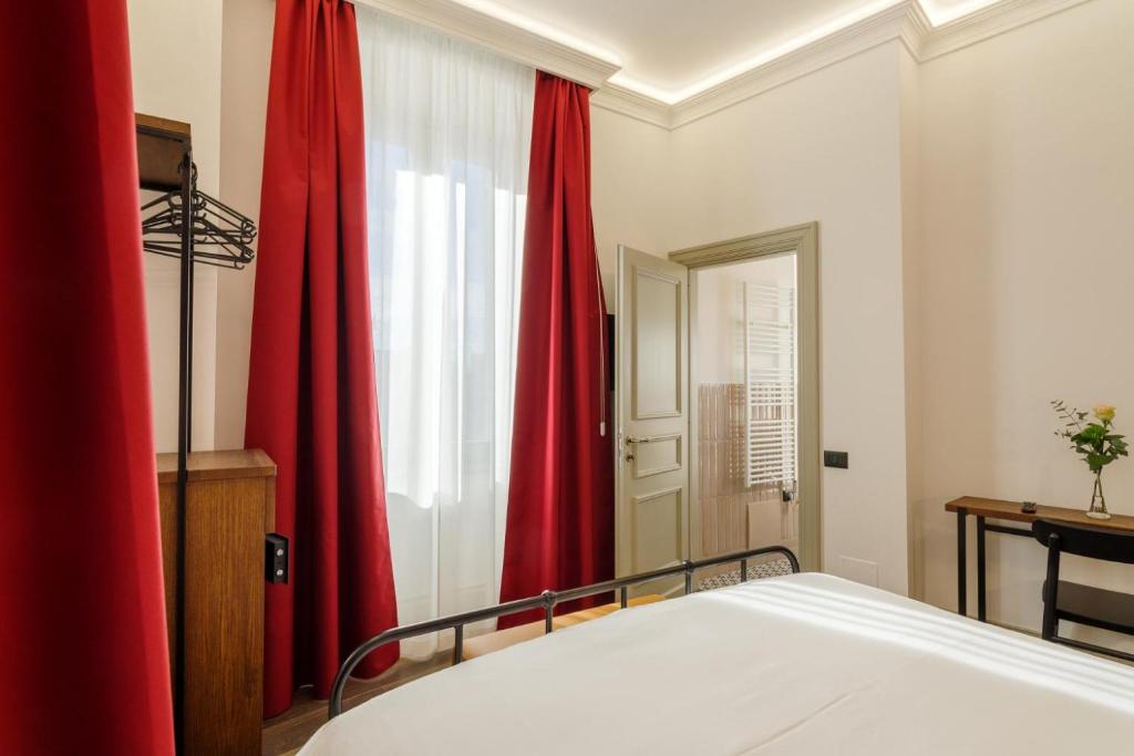Postel nebo postele na pokoji v ubytování Palazzo Fontana
