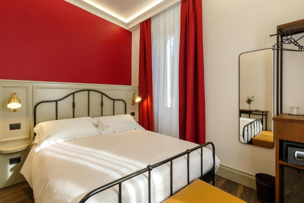Postel nebo postele na pokoji v ubytování Palazzo Fontana