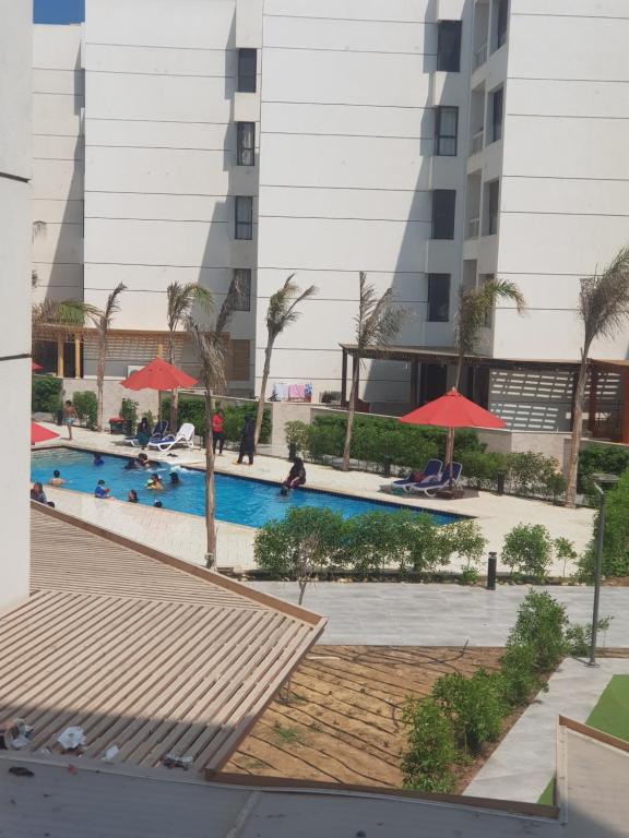 The swimming pool at or close to Porto said بورتوسعيد غرفتين وصاله للأسر فقط