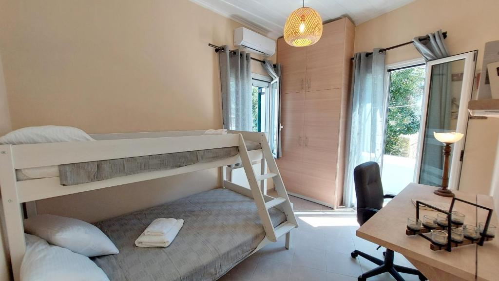 A bed or beds in a room at Epameinondas Luxury House