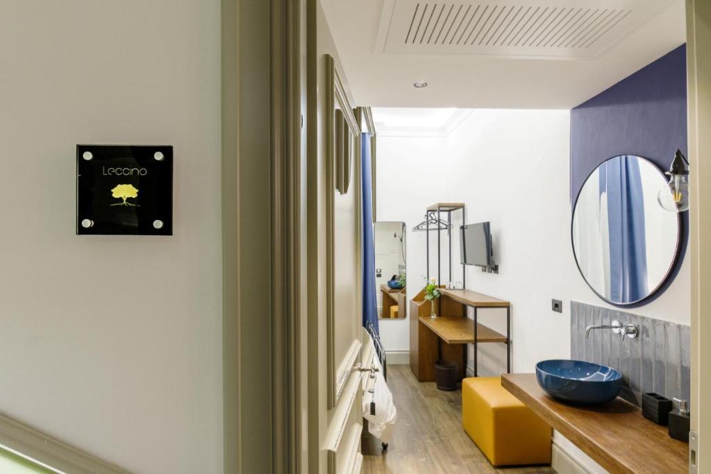 Postel nebo postele na pokoji v ubytování Palazzo Fontana