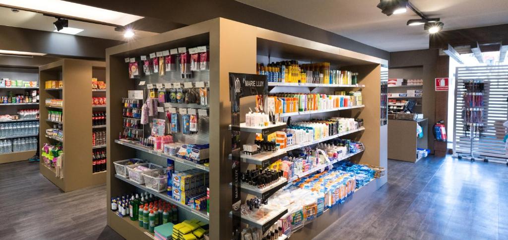 a store aisle with a lot of products on shelves at Sotavento Beach Club in Costa Calma