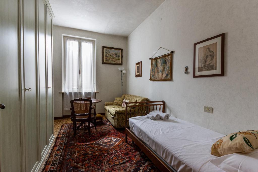Postel nebo postele na pokoji v ubytování Suite Mazzini 23