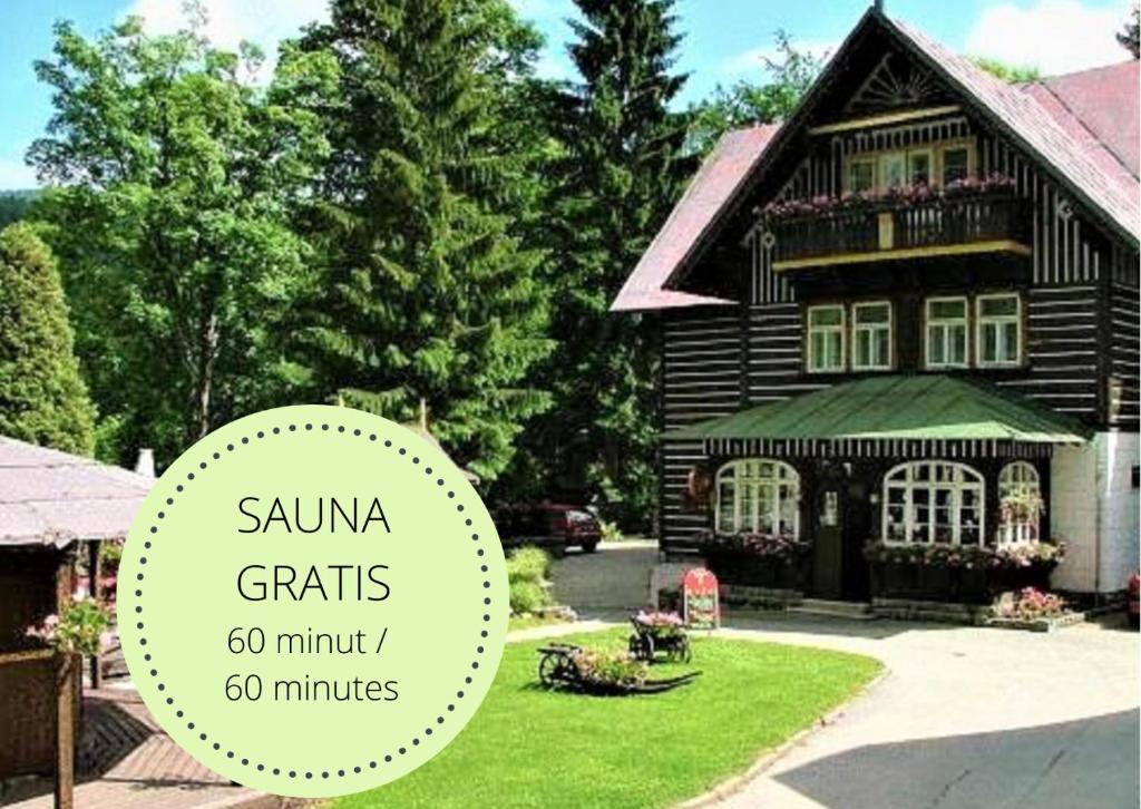a house with the words sauna crafts minutes at Hotel Tři Růže in Špindlerův Mlýn