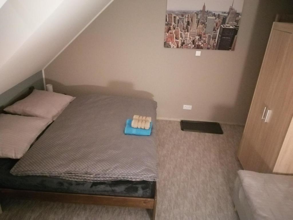 Postel nebo postele na pokoji v ubytování APARTMÁNY PIETRO