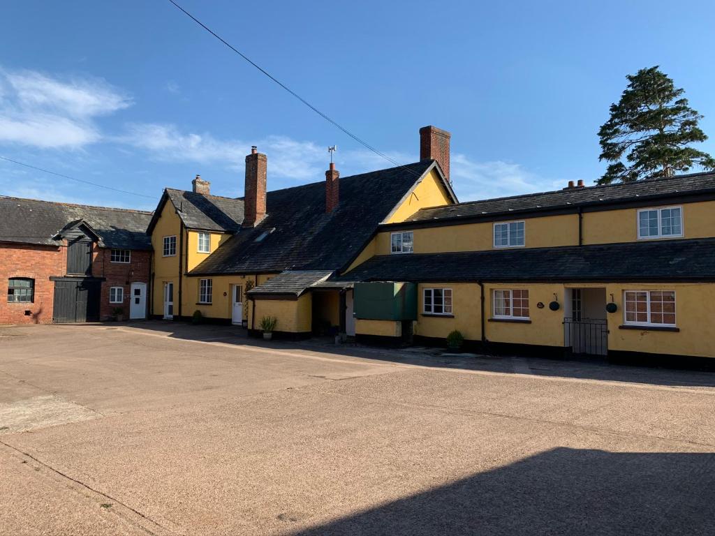 a row of old buildings in a street at Elbury Lodge in Exeter