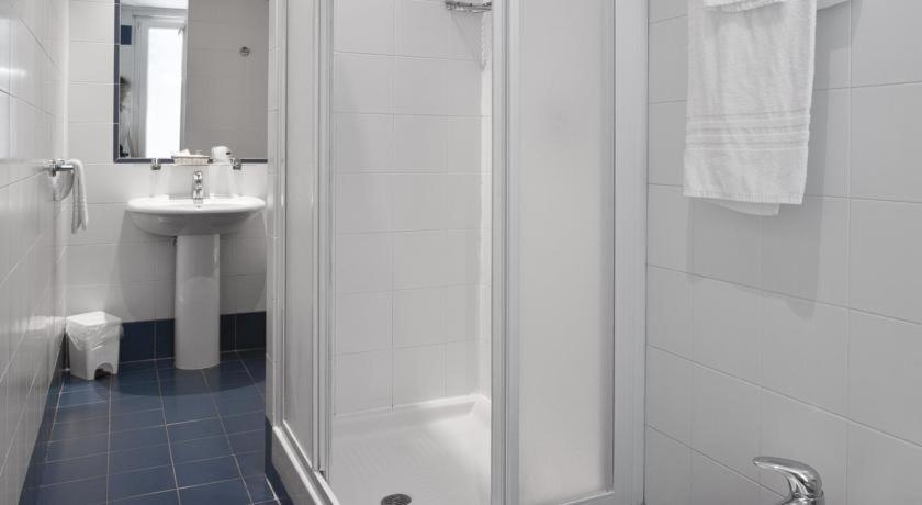 Koupelna v ubytování Hotel Fortuna