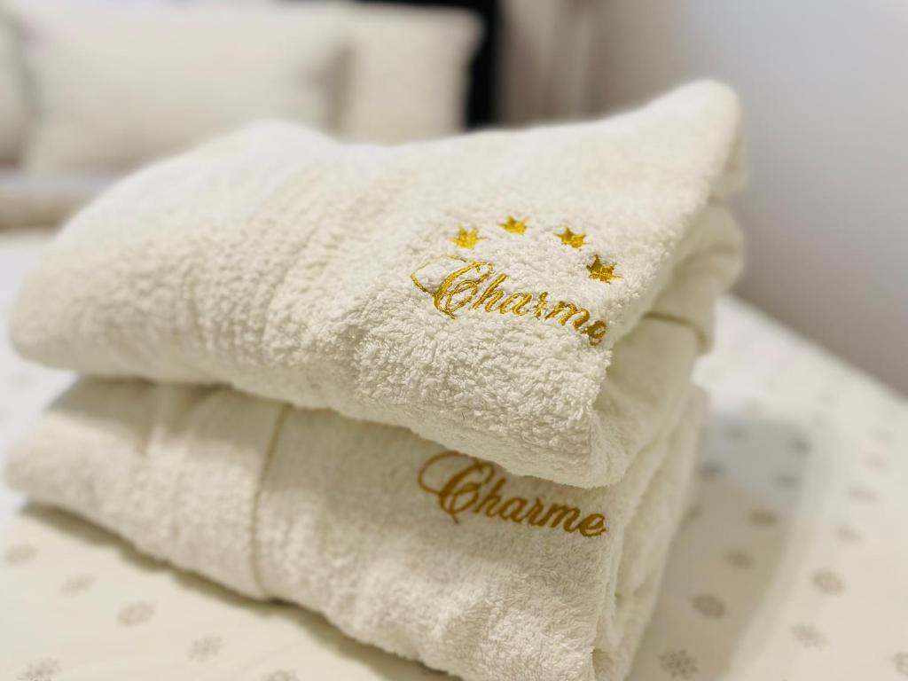 Postel nebo postele na pokoji v ubytování Charme apartman