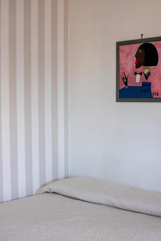 A bed or beds in a room at Villa Cipriano