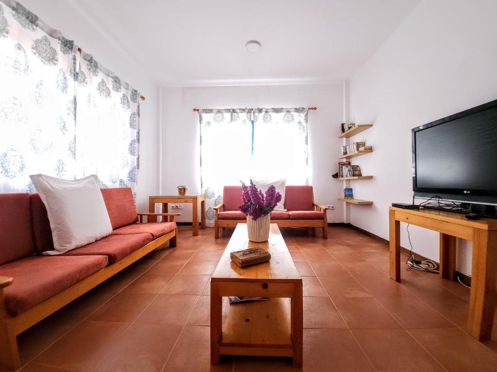 TV a/nebo společenská místnost v ubytování Txada Hostel