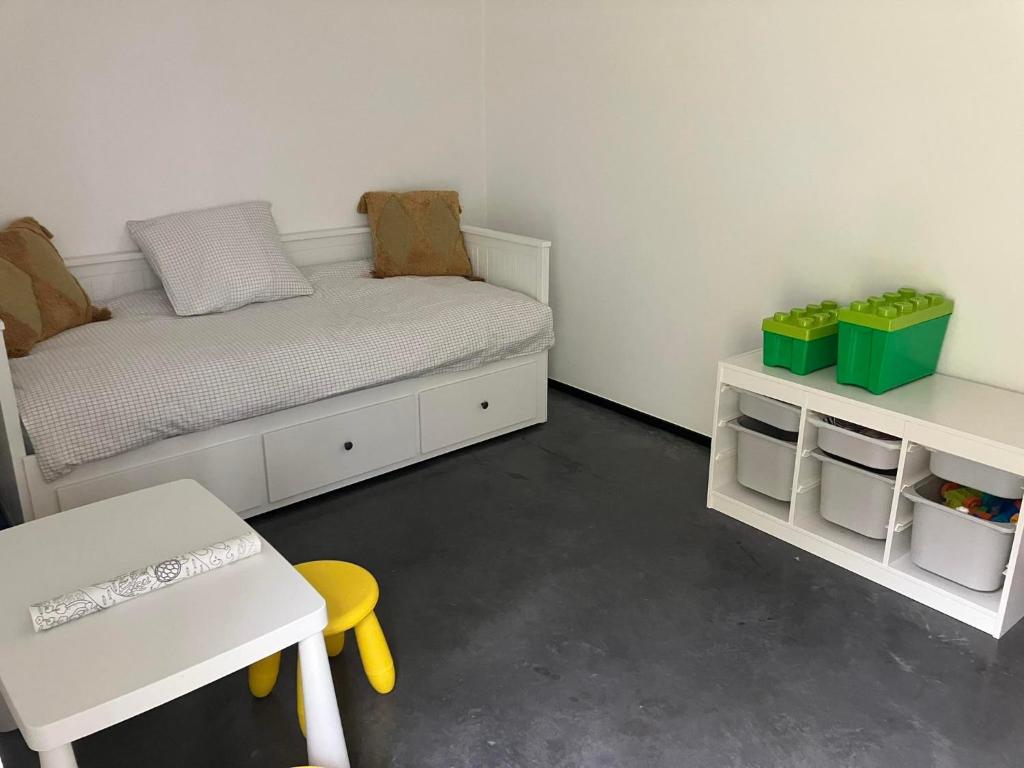 Postel nebo postele na pokoji v ubytování Le beau petit bosquet