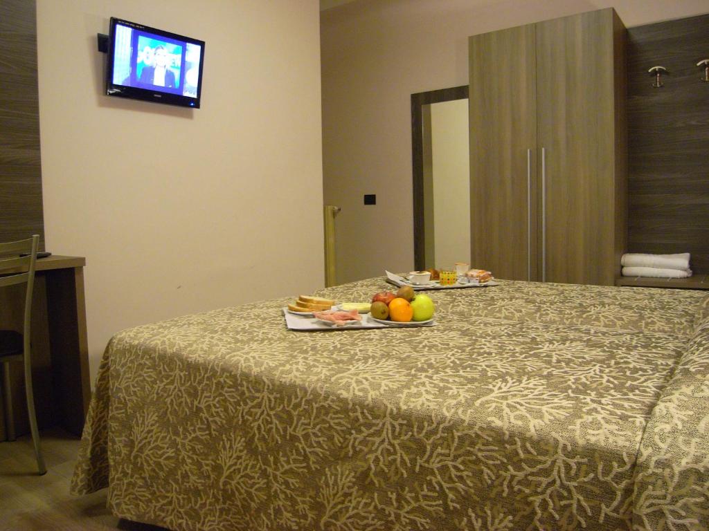 TV a/nebo společenská místnost v ubytování Hotel Siena