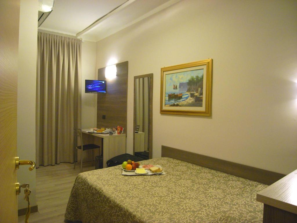 TV a/nebo společenská místnost v ubytování Hotel Siena